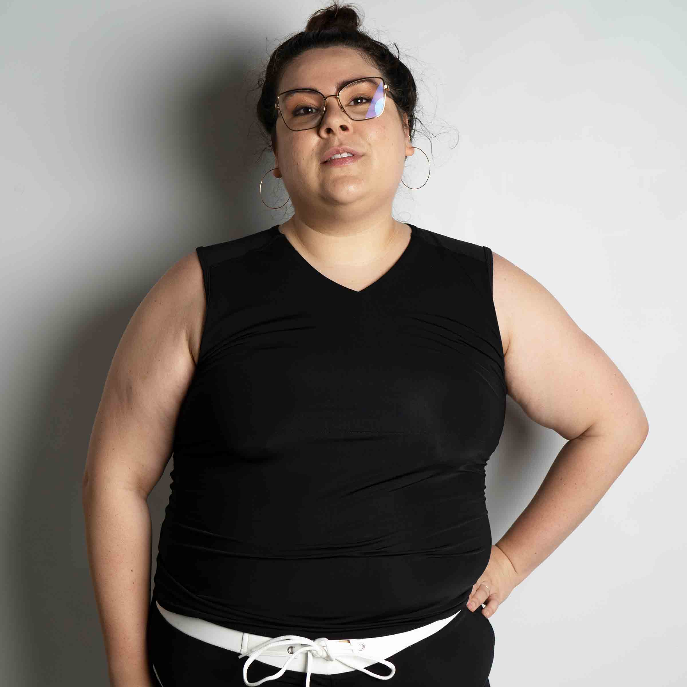 AF Black Swim Tank on model — gender neutral queer swim top for non-binary style