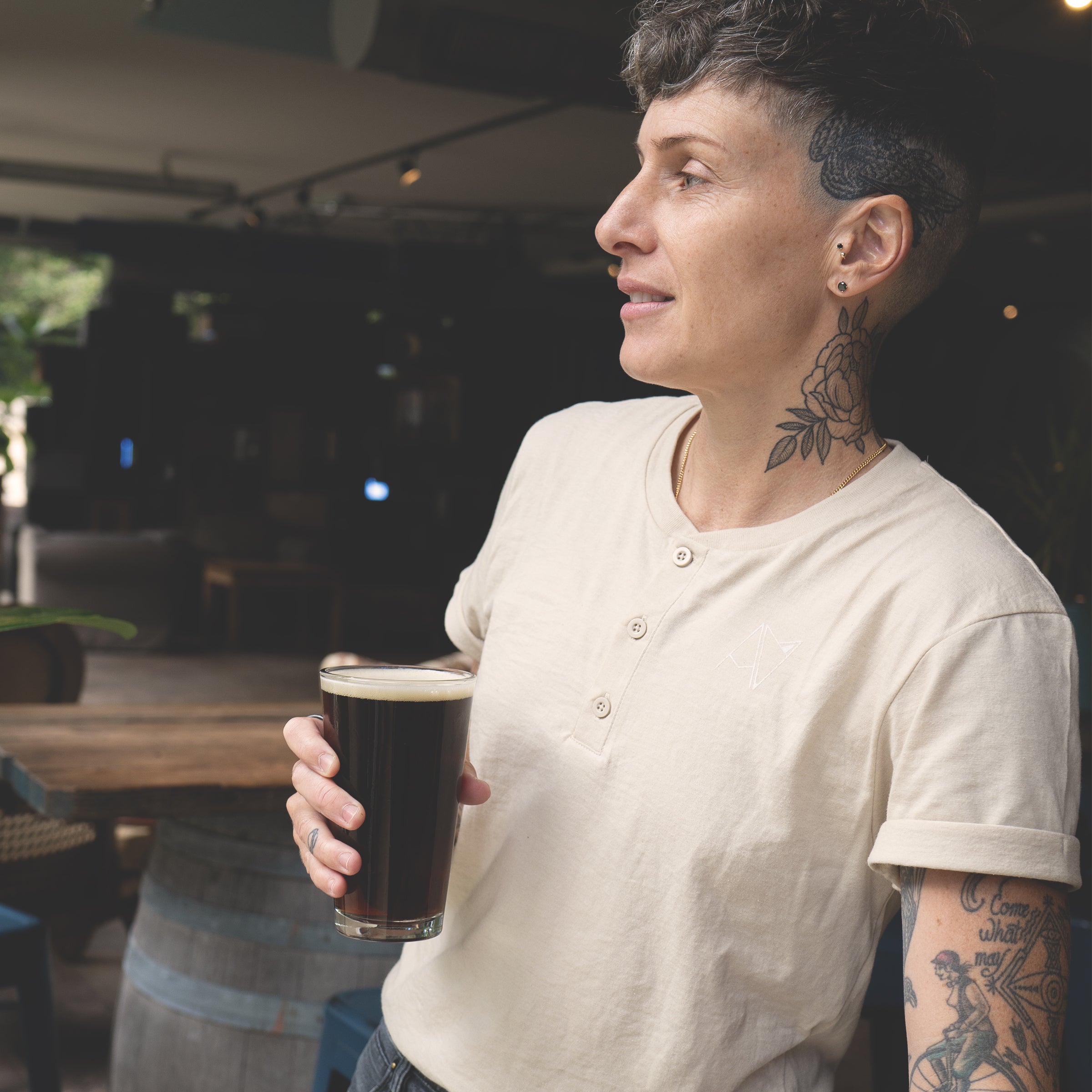 Androgynous Fox Henley styled on model — gender neutral androgynous clothing for queer and transmasc style