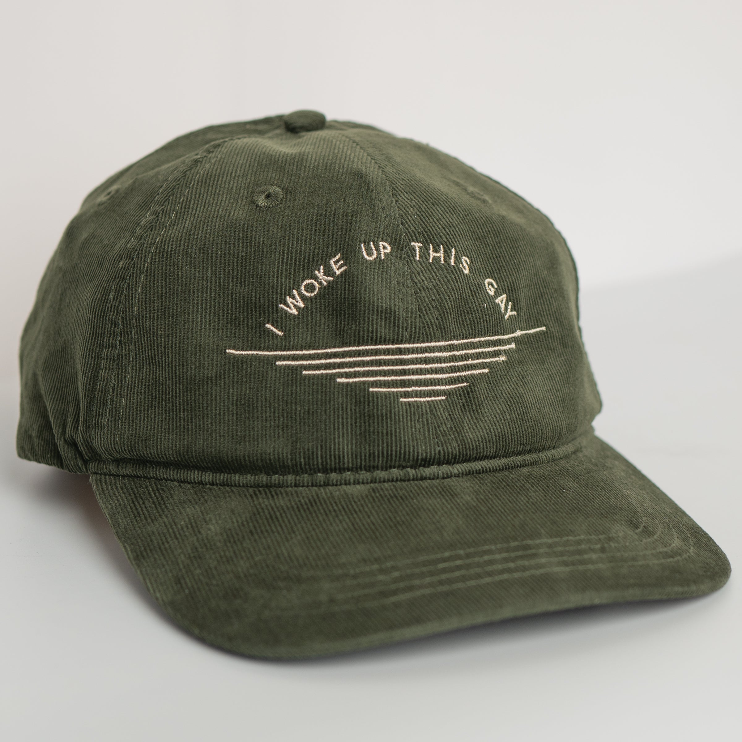 I Woke Up This Gay corduroy hat styled in Army — gender neutral queer hat