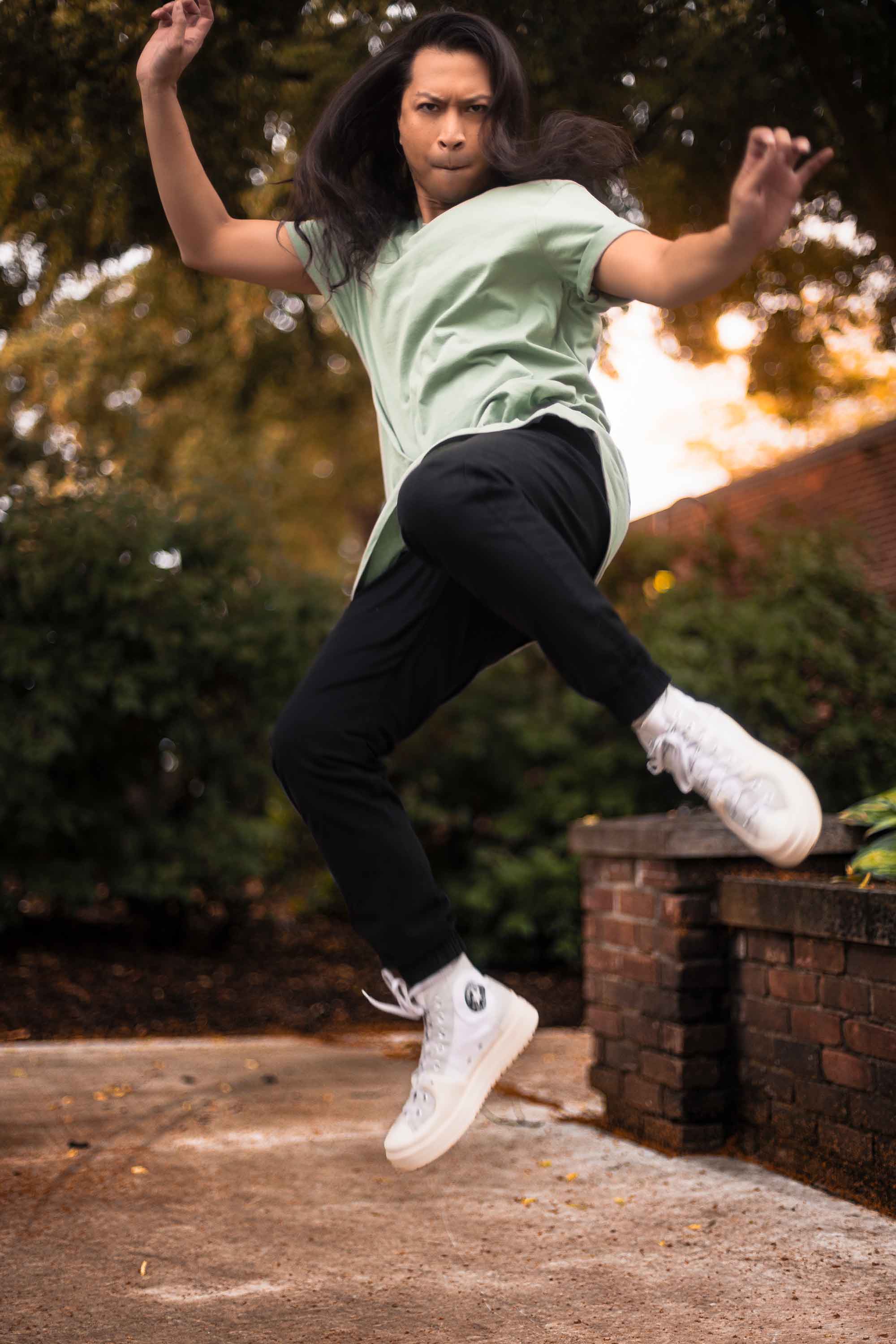 Black joggers on model — gender neutral masc pants for non-binary and queer style