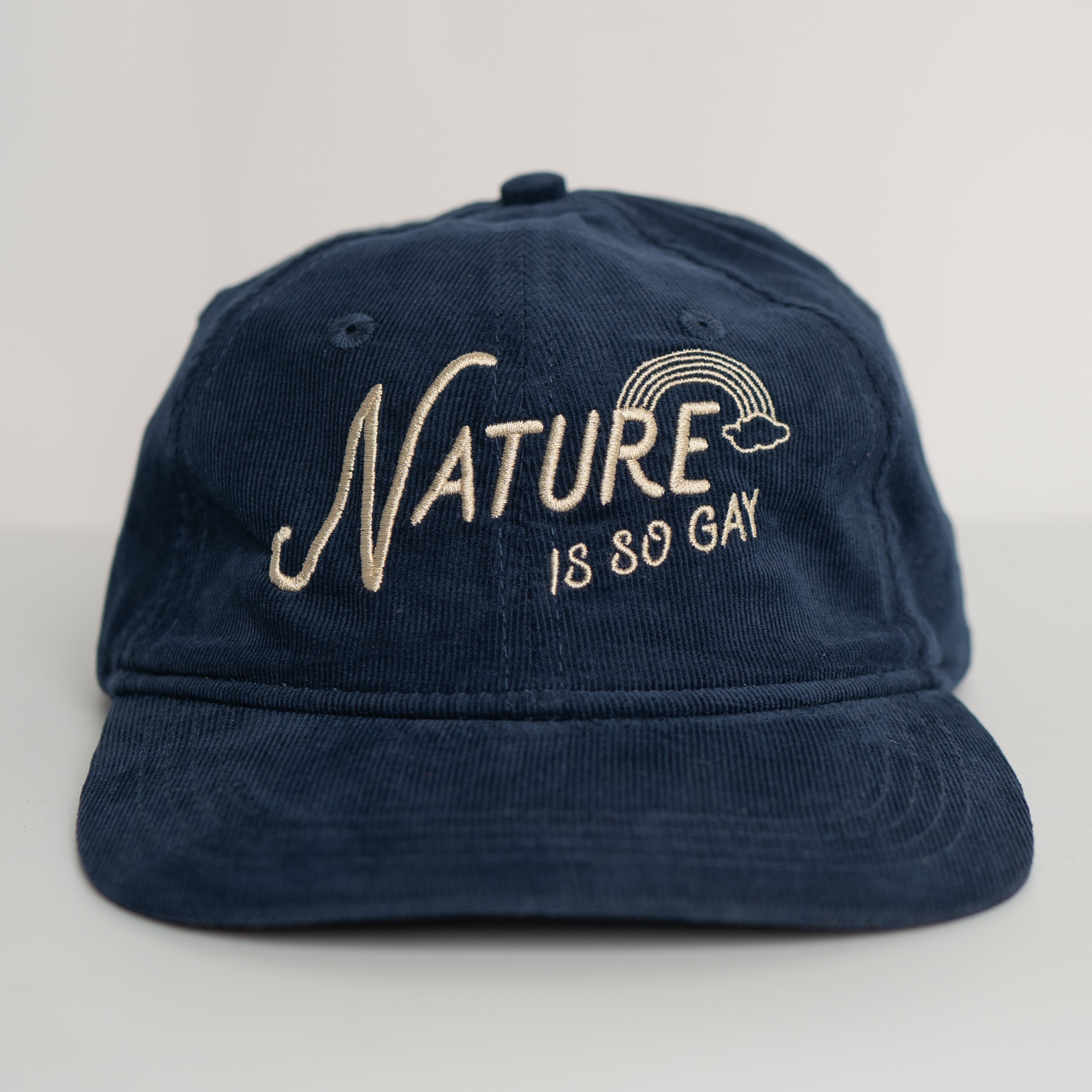 Nature Is So Gay corduroy hat styled in Navy — gender neutral queer hat for outdoor style