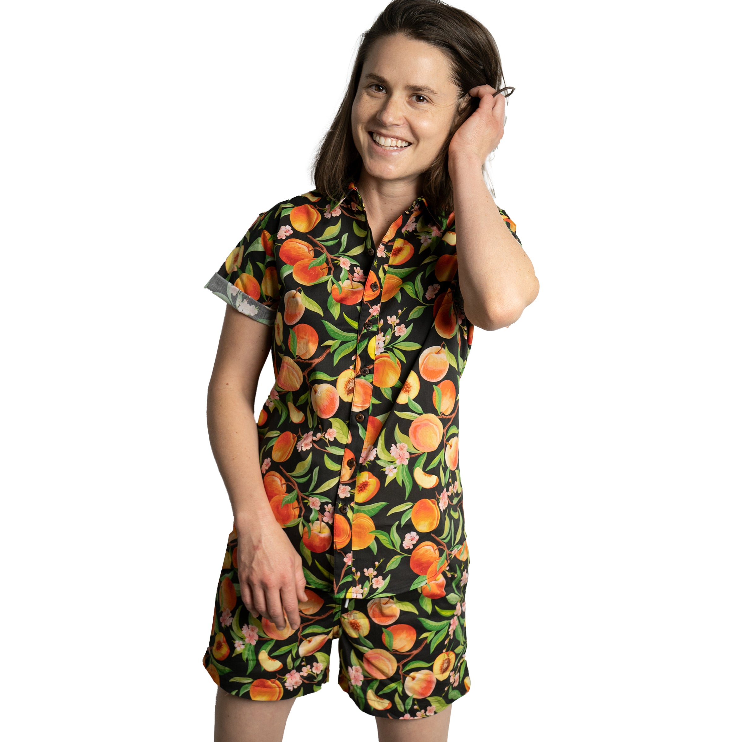 The Cobbler Short Sleeve Button Up in Peach with matching shorts on model — Androgynous Fox androgynous button up shirt