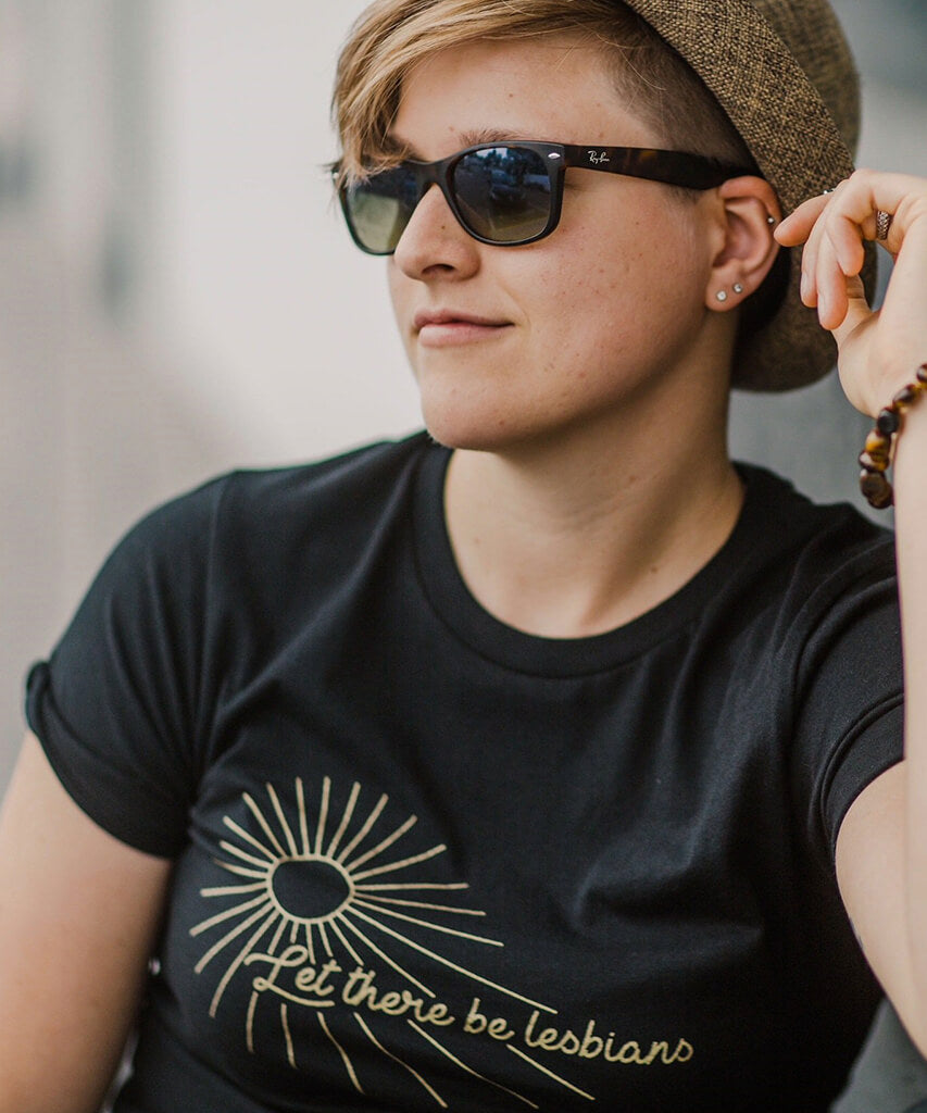 Model wearing Androgynous Fox Let there Be Lesbians black crew neck tee