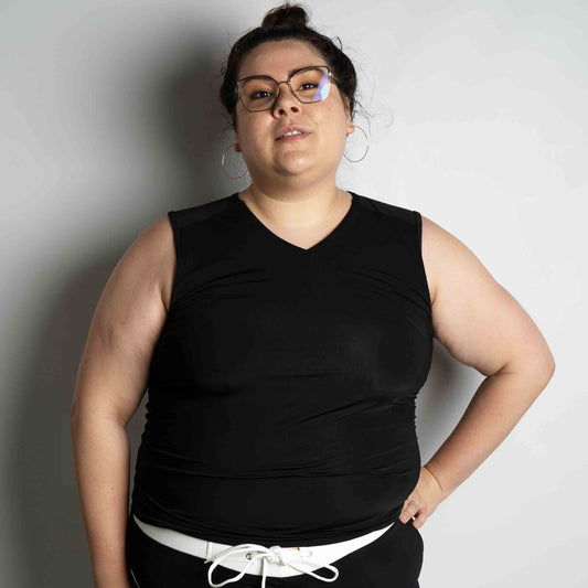 AF Black Swim Tank on model — gender neutral queer swim top for non-binary style