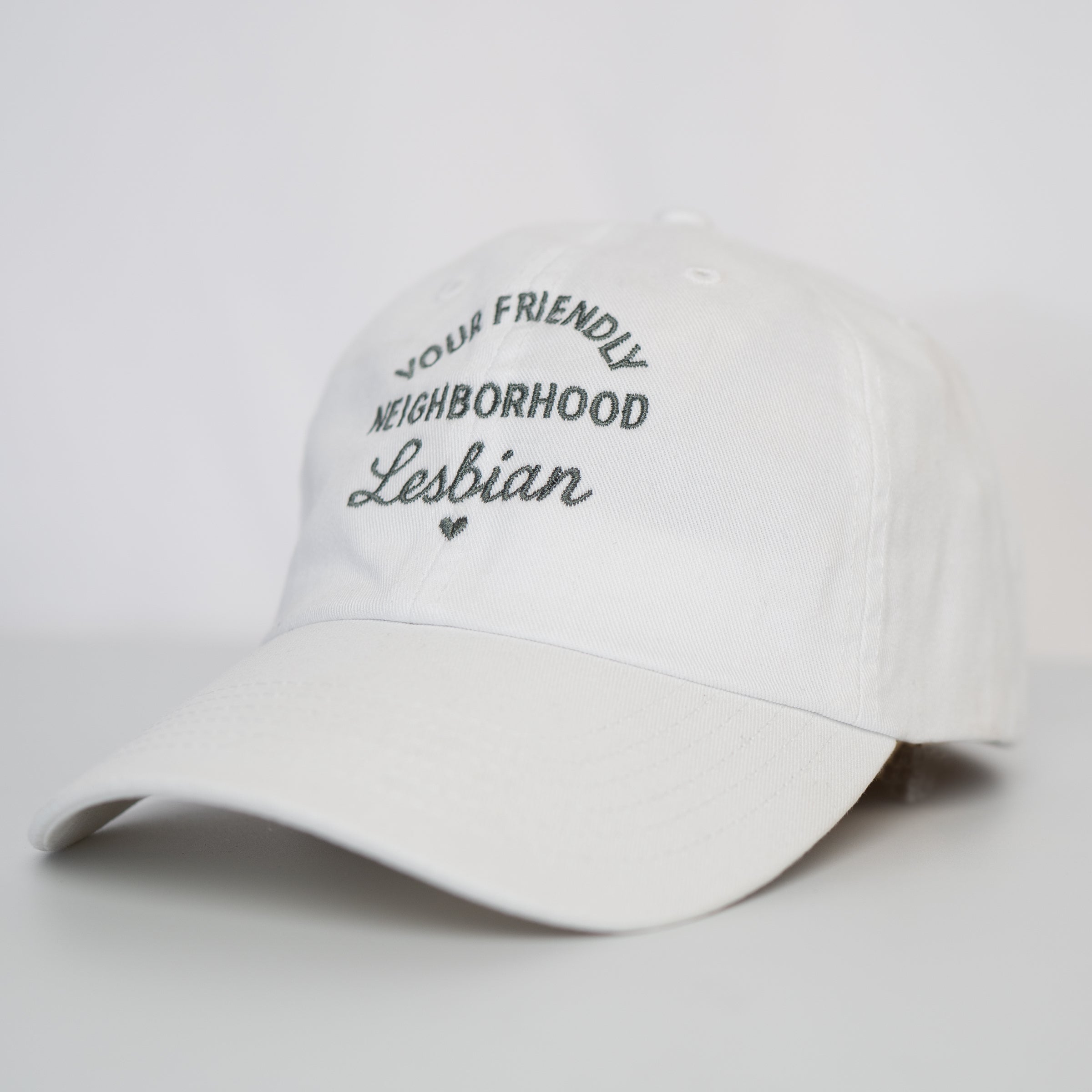 Your Friendly Neighborhood Lesbian embroidered hat in White — gender neutral lesbian accessory