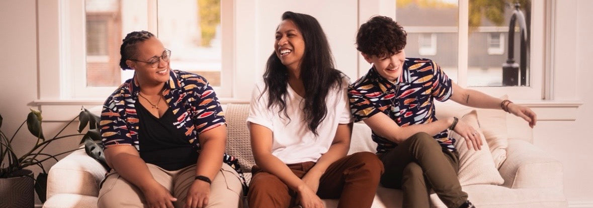 Queer community members wearing gender neutral clothing — inclusive androgynous fashion for LGBTQ+ people