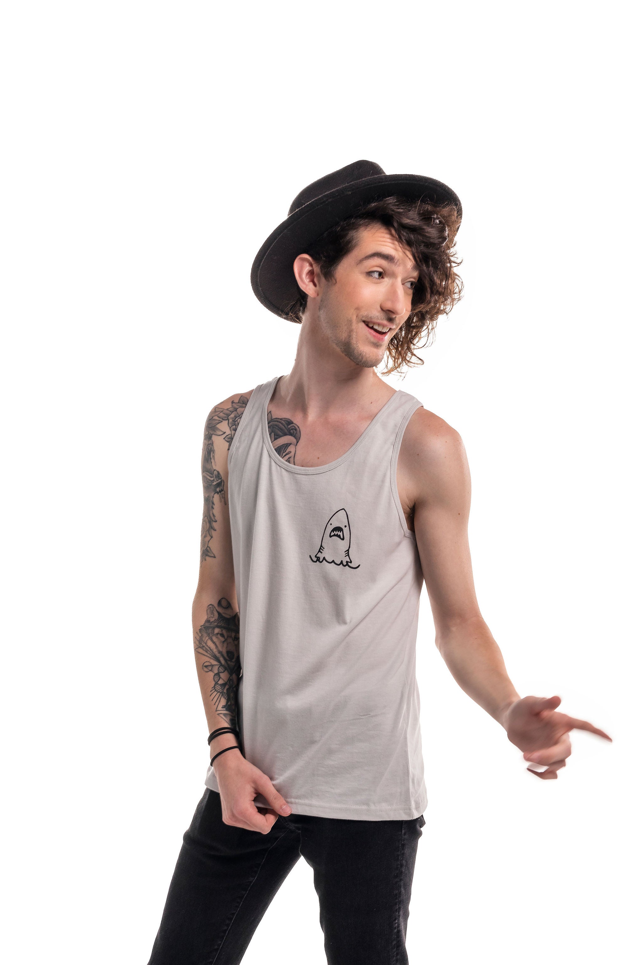 Stick N' Poke tank tops styled on model — queer gender neutral graphic tanks for non-binary style
