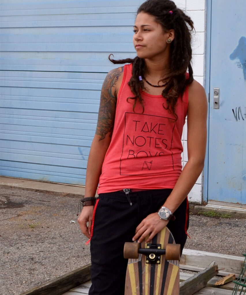 Take Notes Boys tank top in Red Heather on model — non-binary queer gender neutral clothing