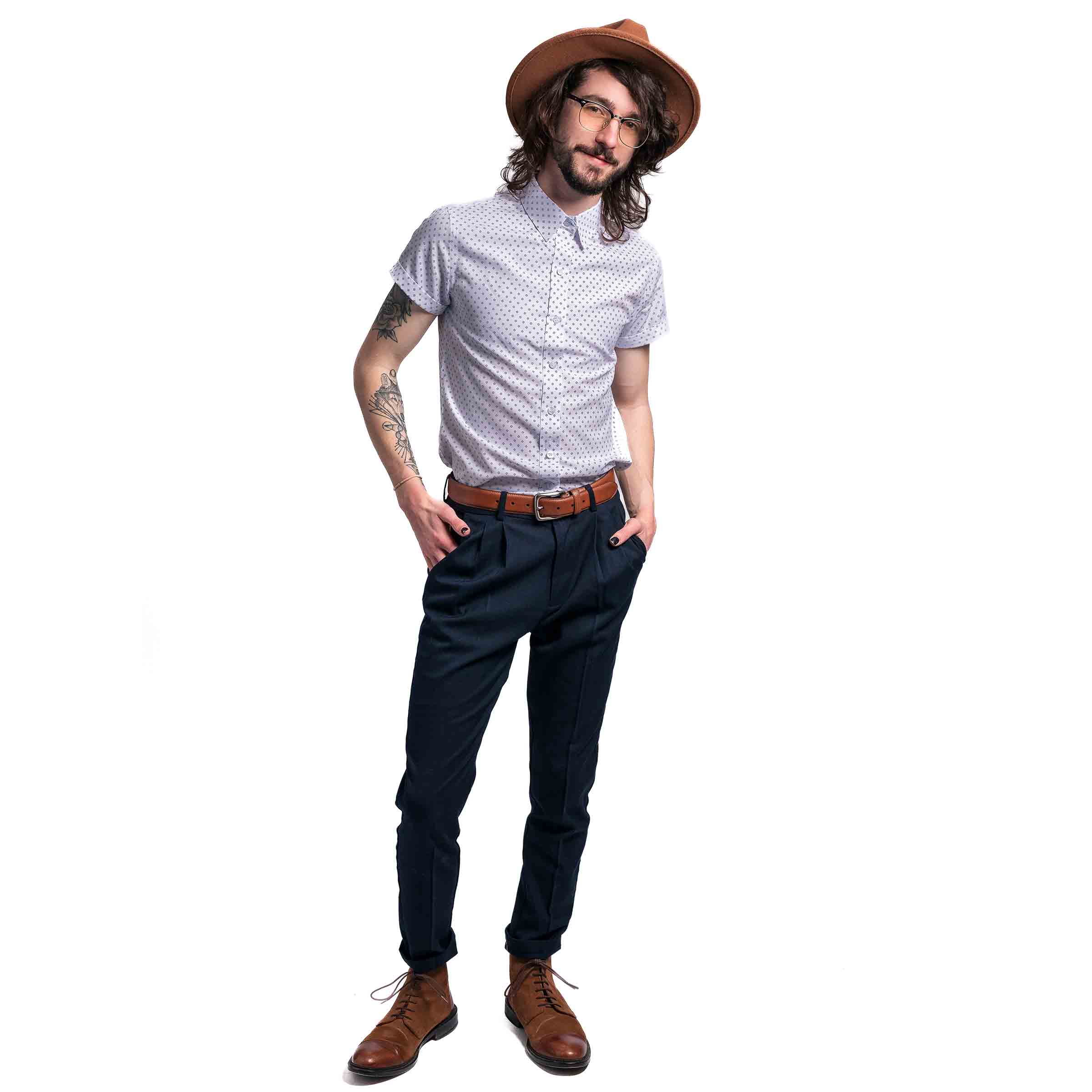 The Mickey Short Sleeve Button Up on model with pleated pants — Androgynous Fox androgynous button up shirt