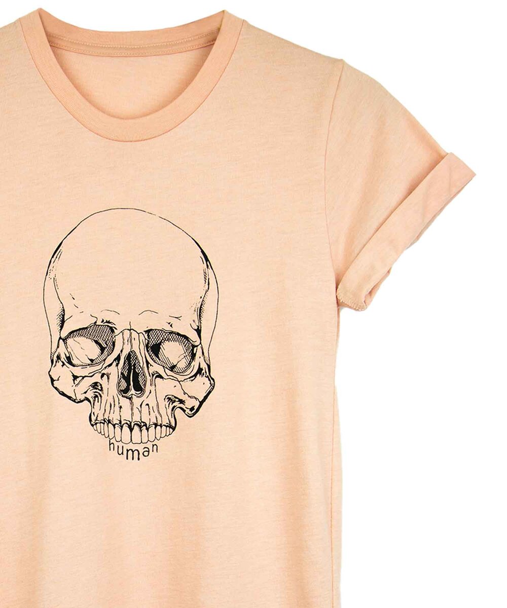 Androgynous Fox dusty peach crew neck with skull printed in black ink and cuffed sleeves. 